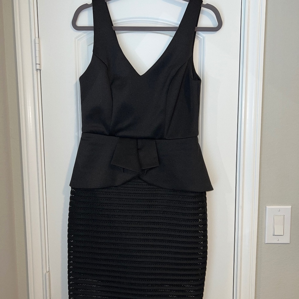 Black peplum wedding guest dress